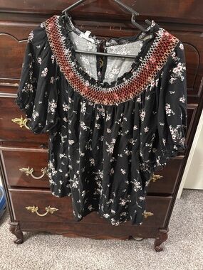 Maurices Black Floral Peasant Top with Red-Orange Smocked Neck